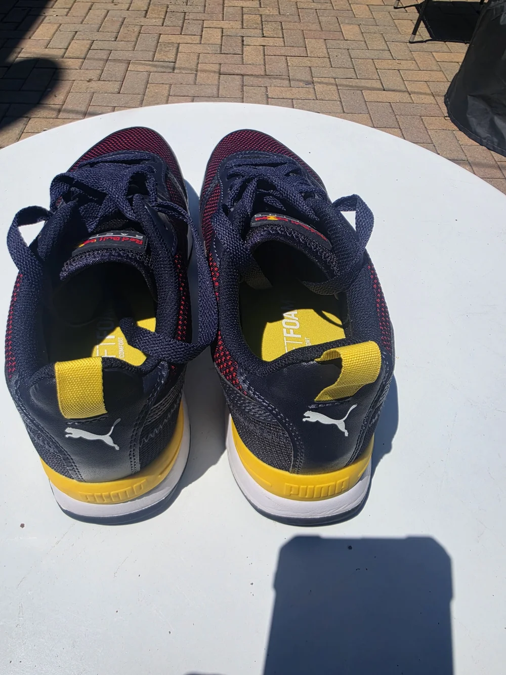 Puma Men’s Navy and Burgundy Sneakers with Yellow Accents